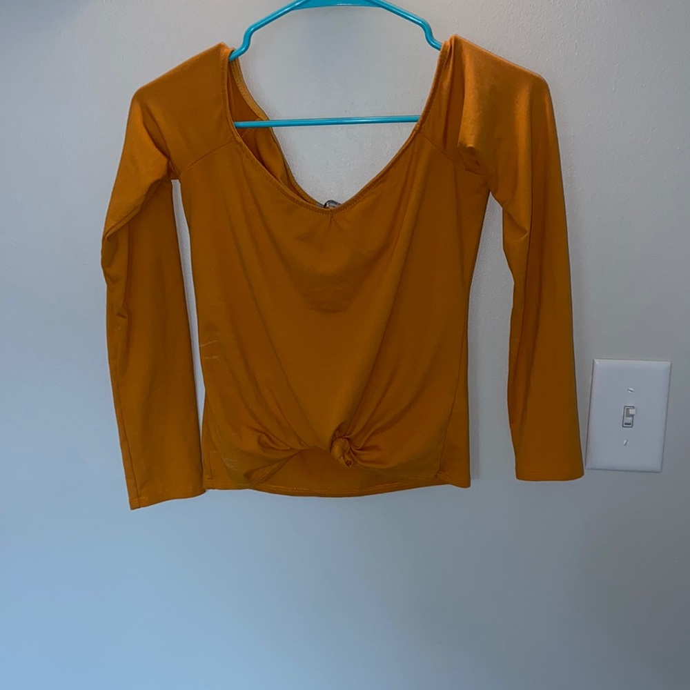 Dark yellow off the shoulder long sleeve shirt with tied knot